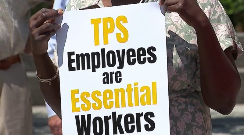 Cartaz de protesto sobre TPS para haitianos nos Estados Unidos